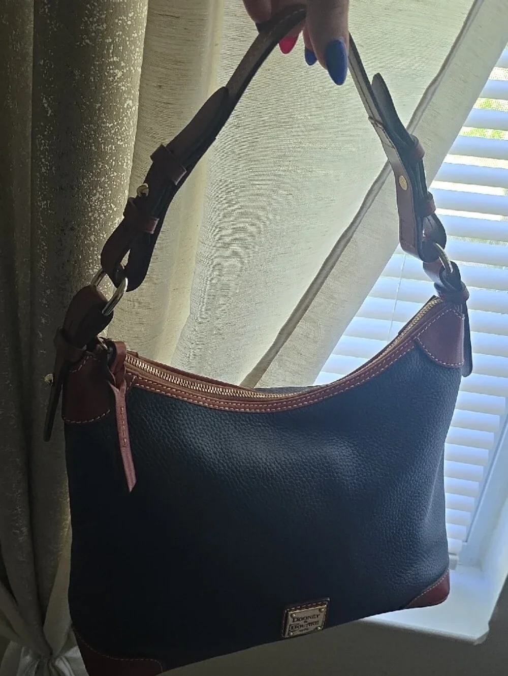 Dooney & Bourke Black Pebble Leather Messenger Bag with Brown Trim